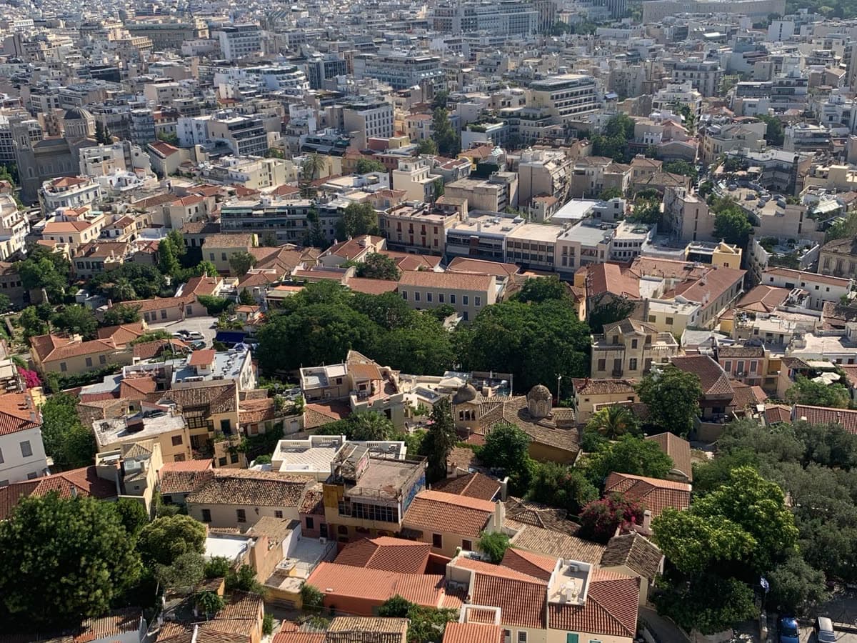 Athens rooftops with Lycabettus Hill in the distance